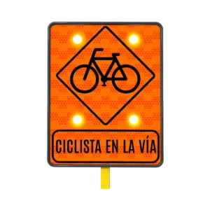 Ciclista en la Vía Señal de Tránsito