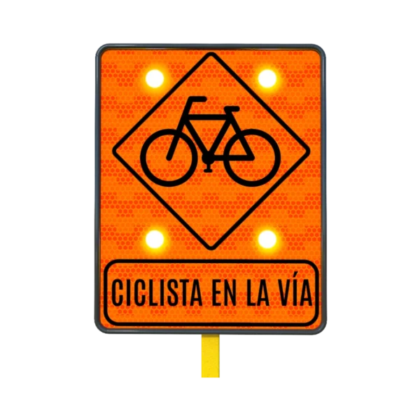 Ciclista en la Vía Señal de Tránsito